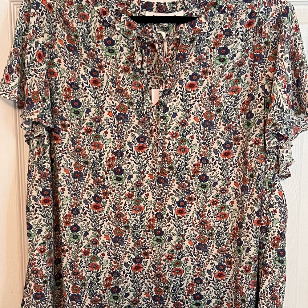 Cute floral top with tie neckline